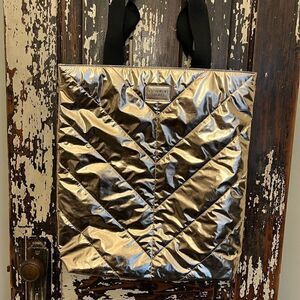 NWOT Victoria’s Secret Rose Gold quilted puffer tote.